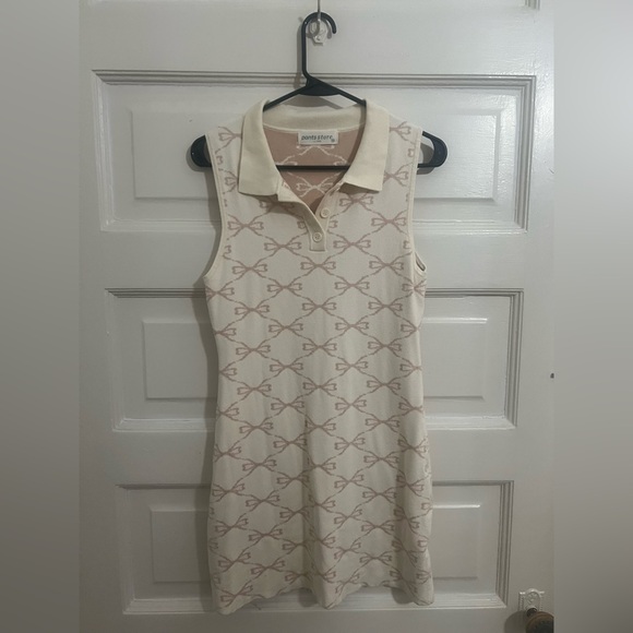 Pants Store Dresses & Skirts - Pink and Cream Sleeveless Polo Dress with bows from Pants Store.